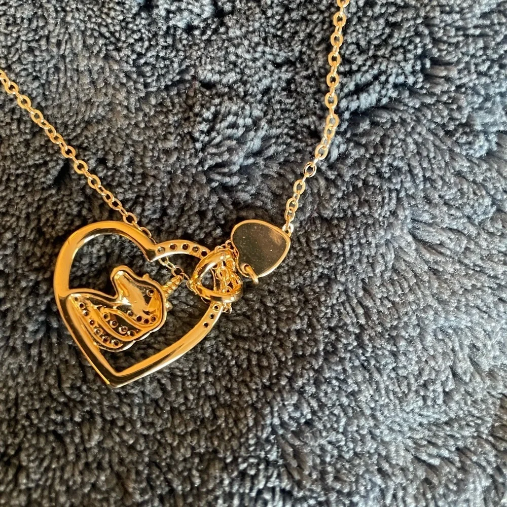 Gold unicorn heart and letter “A” necklace